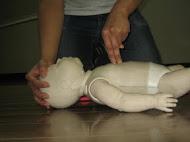 Performing compressions during cpr for infants